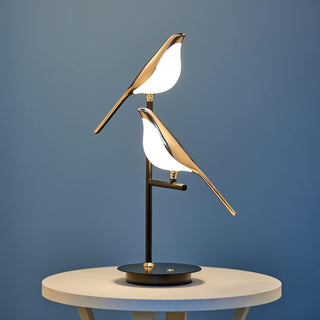 Modern golden bird lamp detail — alloy acrylic warm