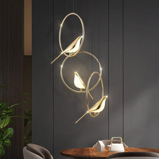 Gold bird motif pendant lamp with LED circle lighting