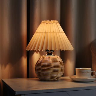 Hand-woven bamboo table lamp — natural fiber design warm light