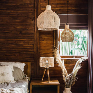 Boho handwoven rattan pendant in interior — kitchen lamp