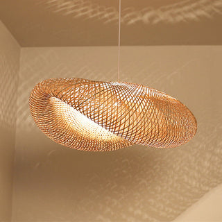 Handwoven bamboo pendant over kitchen counter