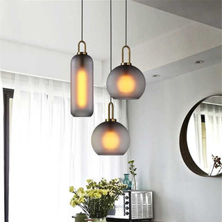 Adjustable glass pendant side view — modern single bulb fixture