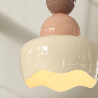 Warm glow pendant detail — cream bedside adjustable fixture