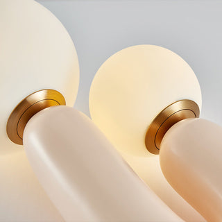 Twin orbs lamp close-up — modern elegant detail