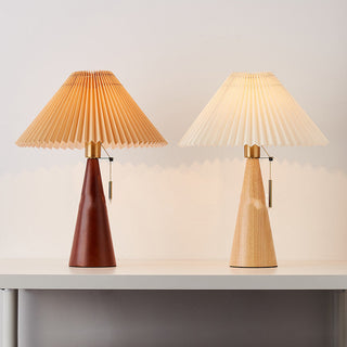 Chic table lamp pleated shade — elegant bedroom side angle