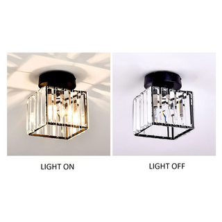 Black hallway ceiling fixture with crystal shade illuminated