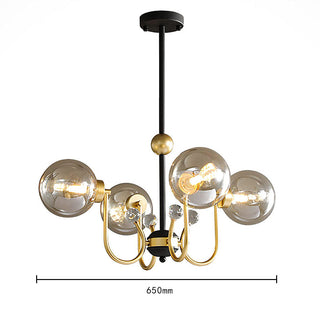 Black sputnik chandelier detail — adjustable metal warm texture