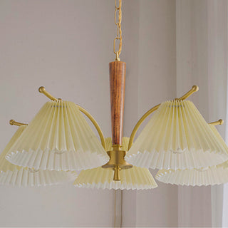 Elegant wood pleated chandelier setting — brass dining wide