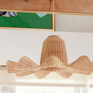 Large rattan pendant showing woven natural fiber detail