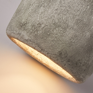 Postmodern pottery pendant top view — artistic brown fixture