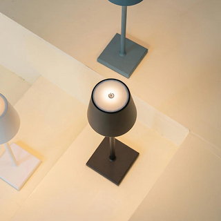 Cordless gold table lamp setting — waterproof warm glow