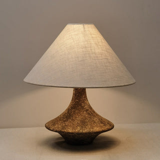 Rustic stone lamp front view — handcrafted warm ambient