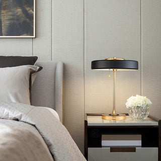 Elegant black lamp gold accent — side angle warm glow