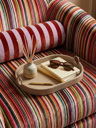 saddle leather oval serving tray styled with towels
