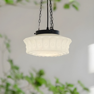 Vintage hanging lamp with white round shade over island