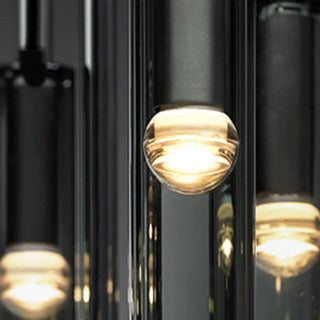 Modern pendant with bottle-shaped glass shade