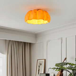 Modern resin pumpkin ceiling lamp in yellow, cozy wood ambient