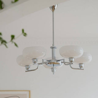 Designer medieval chandelier close-up — iron glass warm ambient detail