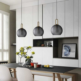 Adjustable glass pendant from above — modern single bulb ceiling lamp