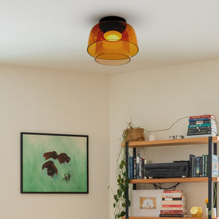 Layered glass ceiling lamp close-up, modern multi-shade design