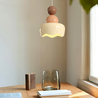 Bedside cream pendant in interior — adjustable warm glow lamp