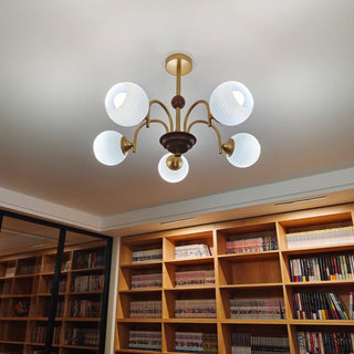 Cream ribbed chandelier side — contemporary glass dining room warm