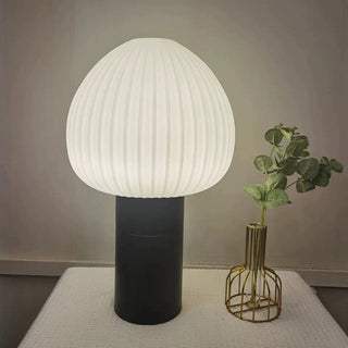 Nordic minimalist lamp illuminated — glass warm bedroom