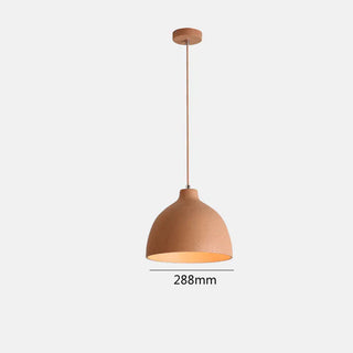 Rustic resin pendant over dining table with warm glow
