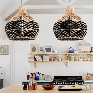Handwoven rattan ceiling lamp casting warm cozy glow