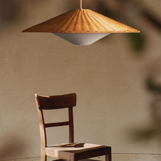 Handcrafted bamboo pendant with natural rattan weave