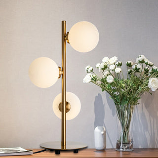 Gold rod opaline globe lamp — designer modern ambient glow