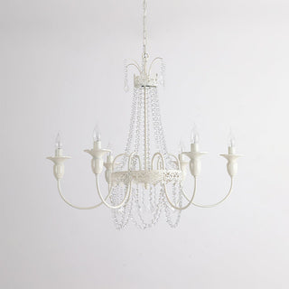 Vintage crystal tassel chandelier close-up — white metal luxury detail