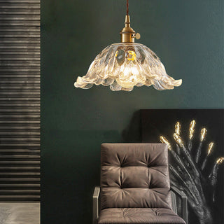 Flower brass pendant side view — clear glass creative fixture