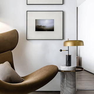 Marble base black lamp detail — gold shade texture