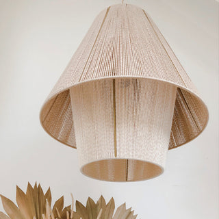 Rustic rope pendant lamp detail — boho dining lantern fixture
