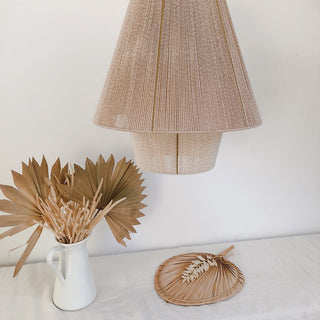 Rope lantern pendant hanging in dining room — rustic boho lamp