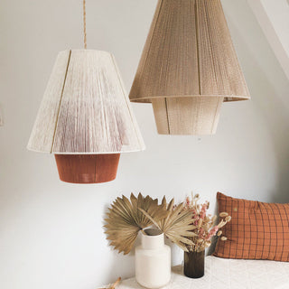 Rustic rope lantern pendant close-up — boho dining ceiling fixture