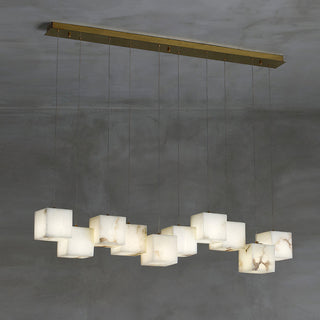 Alabaster geometric pendant close-up — artistic white shade lamp