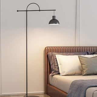 Modern black metal floor lamp — minimalist dining room fixture