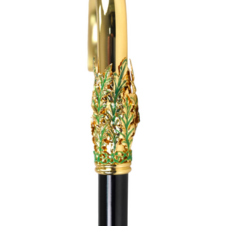 Gold plated hand-painted leaf handle Italian luxury walking cane close-up