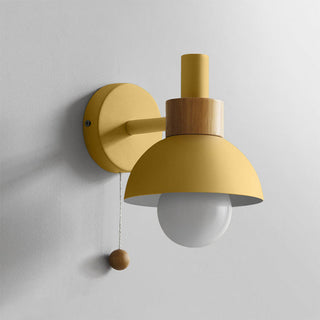 Colorful iron single head wall sconce illuminated — bedroom
