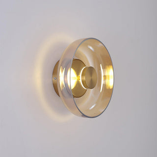 Round clear glass iron frame wall sconce detail — modern