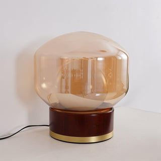 Modern round glass table light — metal wood sleek