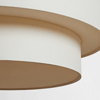 Linen pendant casting soft warm diffused glow