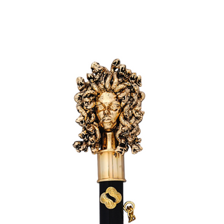 gold-plated long handle handmade Italian luxury shoehorn close-up