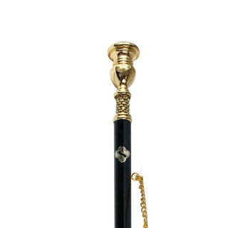 gold-plated brass green crystal accent long handle handcrafted Italian luxury shoehorn close-up