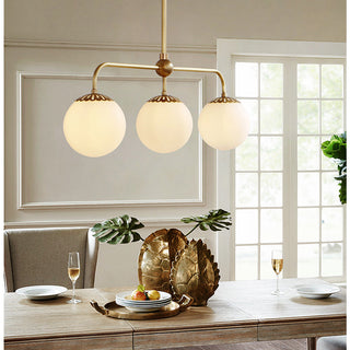 Vintage glass chandelier brass ball warm ambient ceiling light