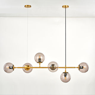 Glass bubble chandelier close-up — modern long rod dining detail