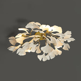 Flower-shaped ceramic ceiling lamp close-up, white petal design