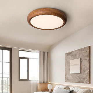 Round Scandinavian LED ceiling lamp – warm wood tone finish